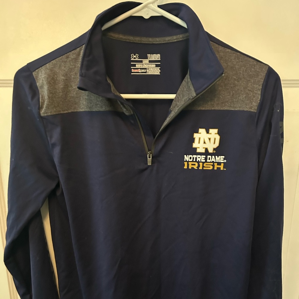 New w/out tags Notre Dame quarter zip YLG loose heat gear long sleeve. Blue/gray